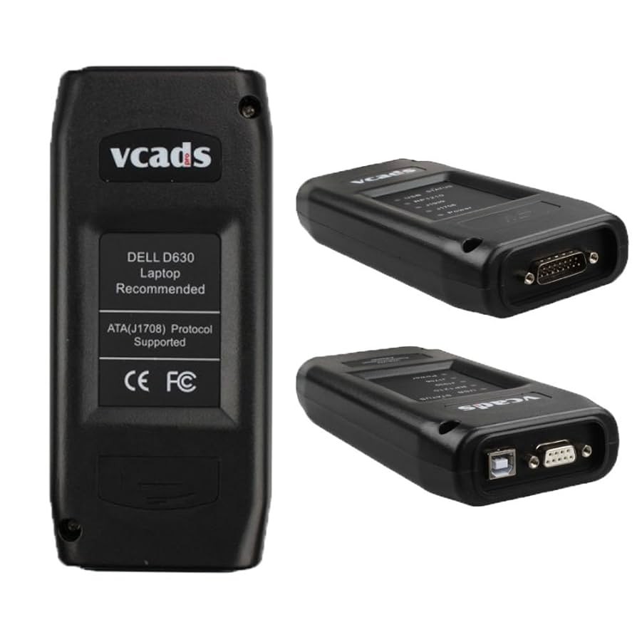 Adaptorul VCADS 3 văzut din trei unghiuri, cu eticheta din spate și cu porturile USB, serial și de vehicul