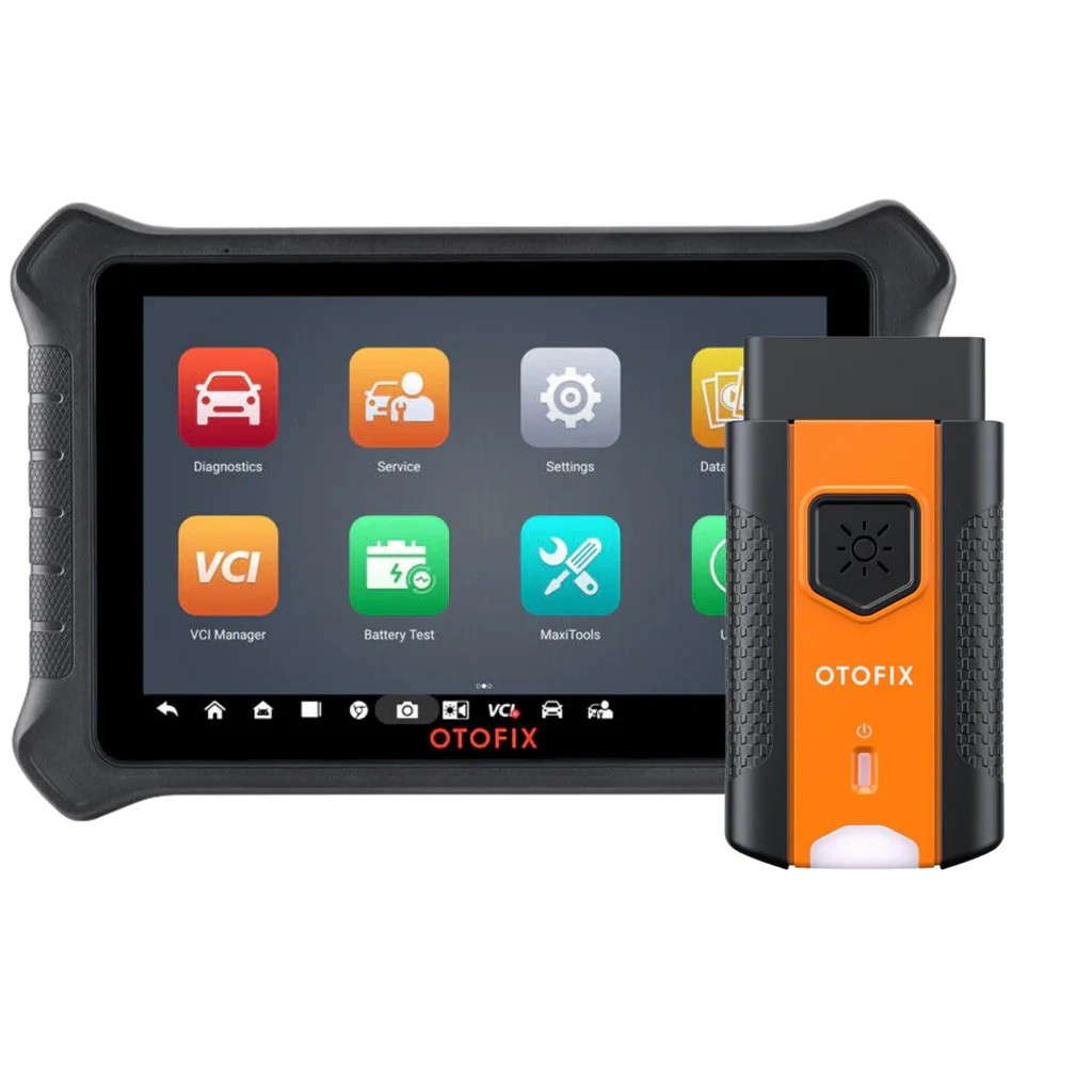 Interfața de diagnoză portocalie cu mufa OBD16 în capăt, fotografiată lângă tabletă